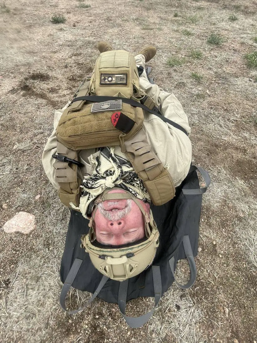 Head-end view of the casualty on the Pocket Litter showing the drag end