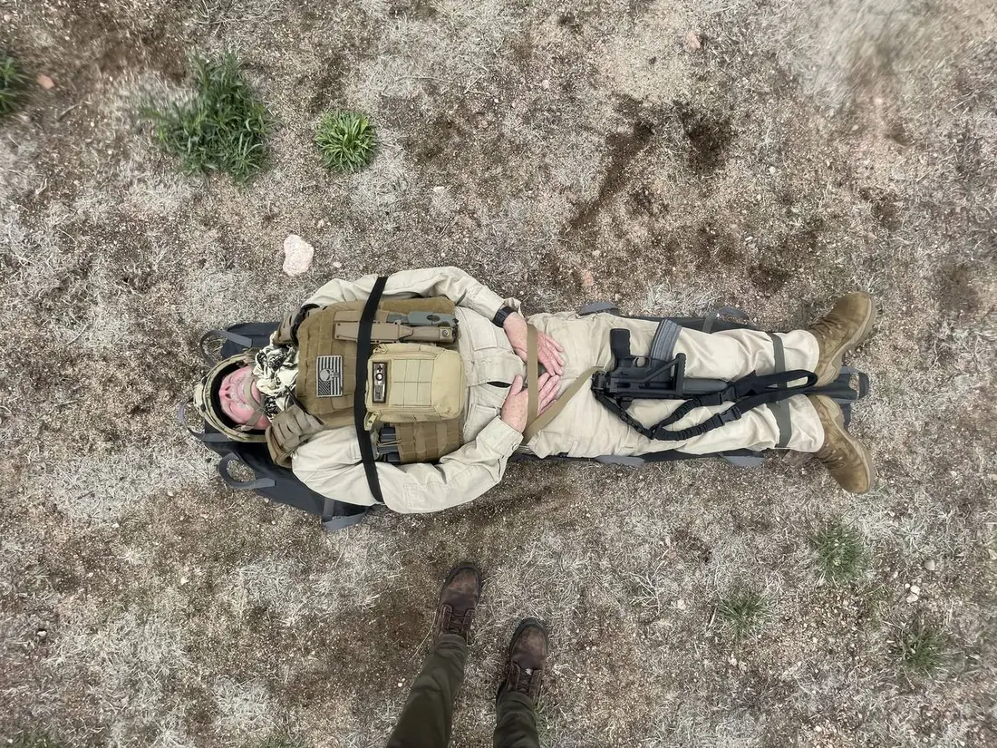 Overhead view of the casualty strapped into the Pocket Litter